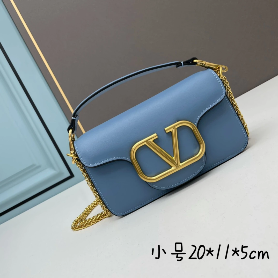 小サイズ ロット19210【520厳選】VALENTINO 華家 レディースMINILOCO カーフスキン新作。メタルチェーンと上質なレザーが織りなすユニークなダブルハンドル。ハンドルを外せばクラッチバッグとしても使用可能。多彩なスタイリングが楽しめる、実用性とファッション性を兼ね備えたアイテム。 Garavani Stud Sign ソフトレザーショルダー